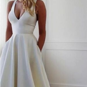 Elegant White V-Neck Sleeveless Fit and Flare Dress